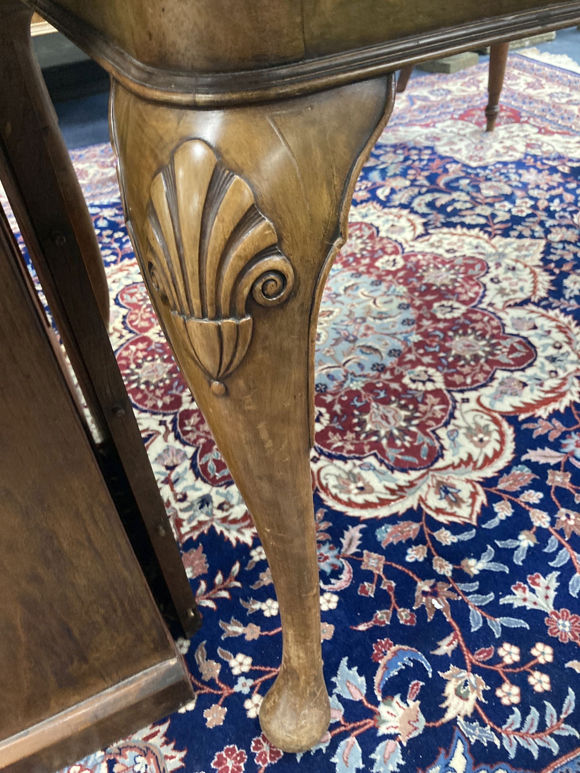 A Queen Anne revival walnut extending dining table, length 182cm extended (one spare leaf), width 90cm, height 74cm